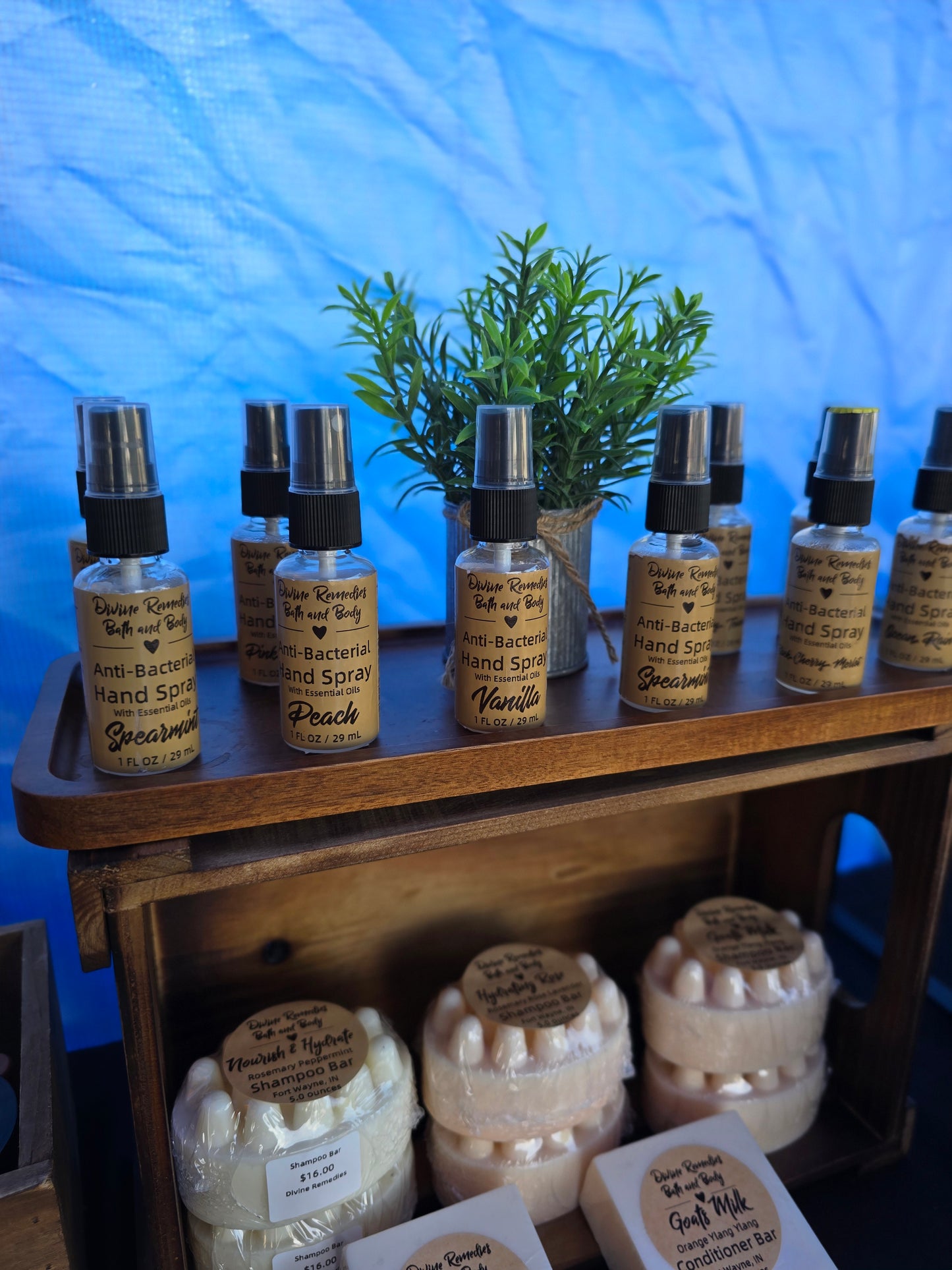 Collection of soap bars and bottles on a blue surface