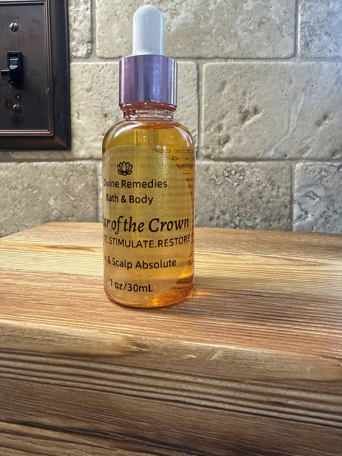 Back label with directions on Divine Remedies Nectar of the Crown hair oil bottle