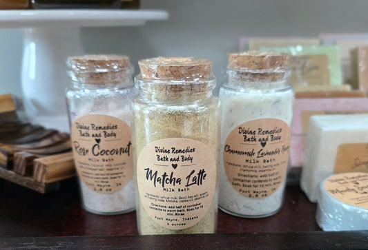 Small bottles with labels on a shelf in a store